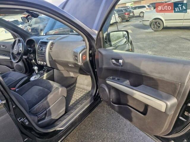 Черный Ниссан ИксТрейл, объемом двигателя 2 л и пробегом 114 тыс. км за 14000 $, фото 15 на Automoto.ua