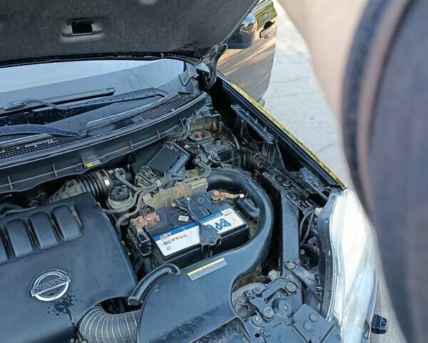 Черный Ниссан ИксТрейл, объемом двигателя 2 л и пробегом 132 тыс. км за 12800 $, фото 12 на Automoto.ua