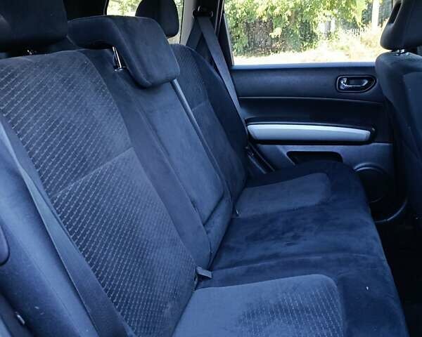 Черный Ниссан ИксТрейл, объемом двигателя 2 л и пробегом 132 тыс. км за 12800 $, фото 26 на Automoto.ua