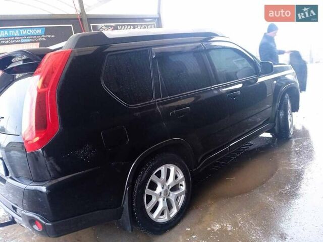 Черный Ниссан ИксТрейл, объемом двигателя 2 л и пробегом 230 тыс. км за 10400 $, фото 3 на Automoto.ua