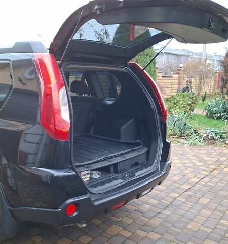 Черный Ниссан ИксТрейл, объемом двигателя 2 л и пробегом 213 тыс. км за 11950 $, фото 21 на Automoto.ua