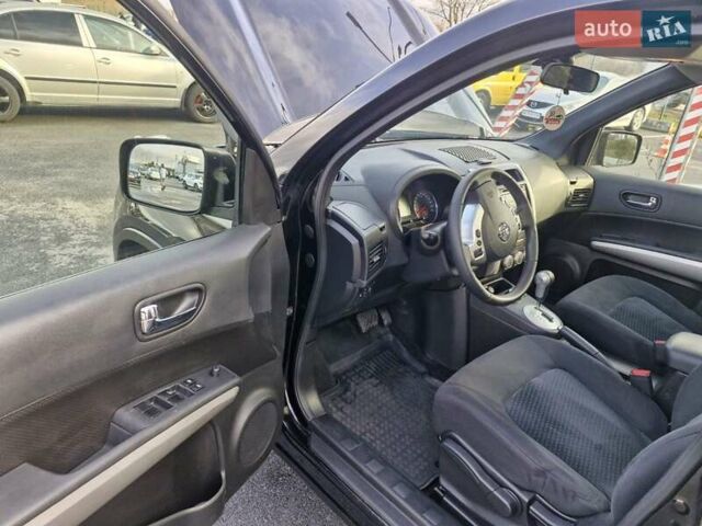 Черный Ниссан ИксТрейл, объемом двигателя 2 л и пробегом 114 тыс. км за 14000 $, фото 11 на Automoto.ua