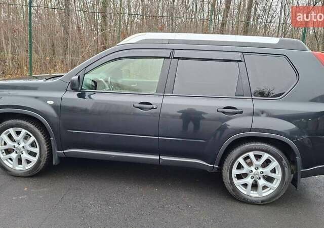 Черный Ниссан ИксТрейл, объемом двигателя 2 л и пробегом 213 тыс. км за 11950 $, фото 7 на Automoto.ua