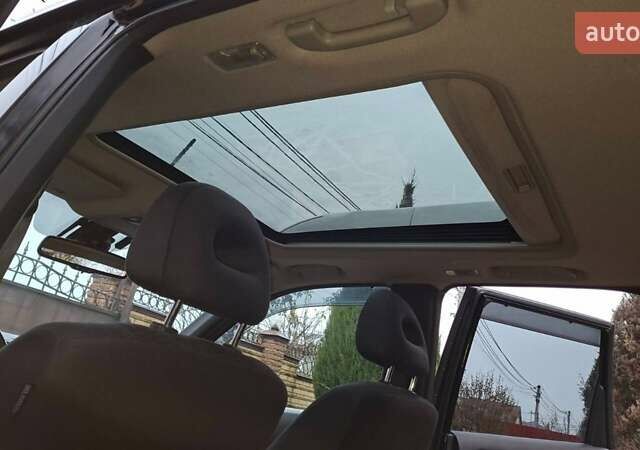 Черный Ниссан ИксТрейл, объемом двигателя 2 л и пробегом 213 тыс. км за 11950 $, фото 14 на Automoto.ua