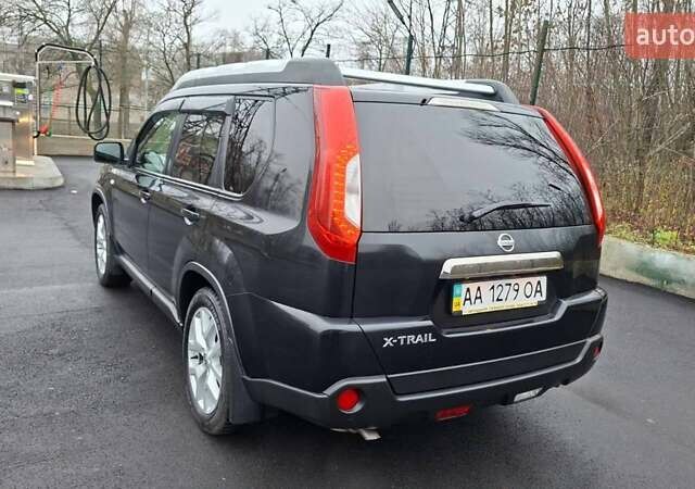 Черный Ниссан ИксТрейл, объемом двигателя 2 л и пробегом 213 тыс. км за 11950 $, фото 6 на Automoto.ua