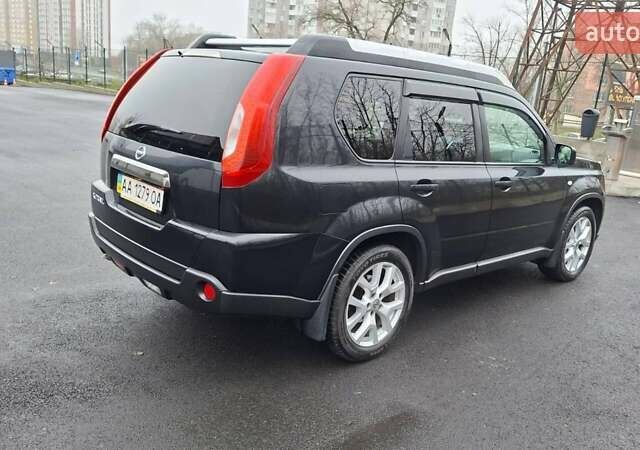 Черный Ниссан ИксТрейл, объемом двигателя 2 л и пробегом 213 тыс. км за 11950 $, фото 10 на Automoto.ua