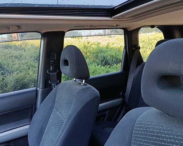 Черный Ниссан ИксТрейл, объемом двигателя 2 л и пробегом 132 тыс. км за 12800 $, фото 9 на Automoto.ua