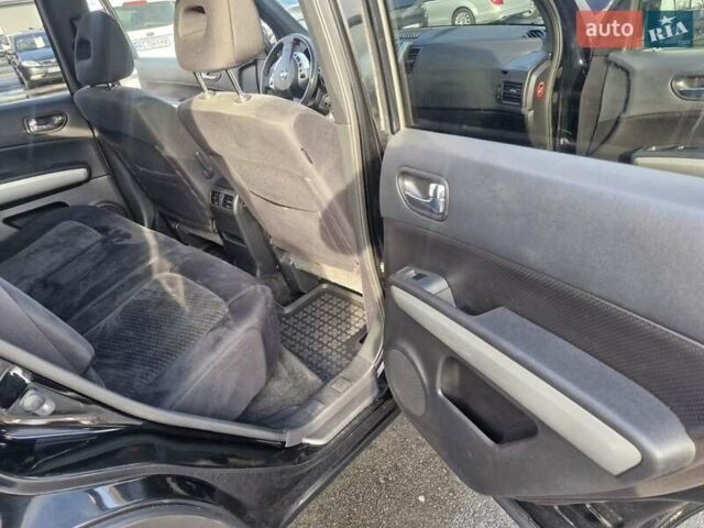 Черный Ниссан ИксТрейл, объемом двигателя 2 л и пробегом 114 тыс. км за 14000 $, фото 16 на Automoto.ua