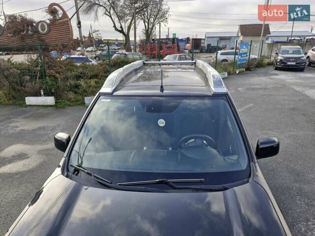 Черный Ниссан ИксТрейл, объемом двигателя 2 л и пробегом 114 тыс. км за 14000 $, фото 7 на Automoto.ua