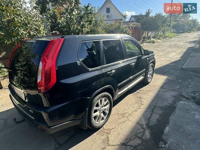 Чорний Ніссан ІксТрейл, об'ємом двигуна 2 л та пробігом 228 тис. км за 15200 $, фото 3 на Automoto.ua