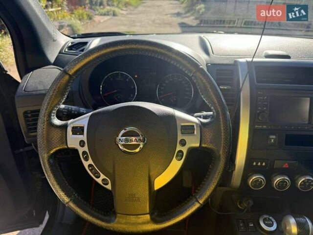 Чорний Ніссан ІксТрейл, об'ємом двигуна 2 л та пробігом 228 тис. км за 15200 $, фото 12 на Automoto.ua