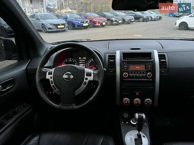 Черный Ниссан ИксТрейл, объемом двигателя 2 л и пробегом 250 тыс. км за 12990 $, фото 13 на Automoto.ua