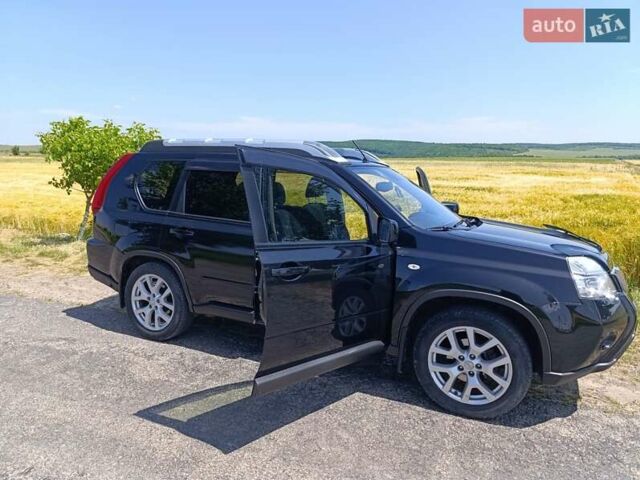 Черный Ниссан ИксТрейл, объемом двигателя 2 л и пробегом 206 тыс. км за 11600 $, фото 8 на Automoto.ua