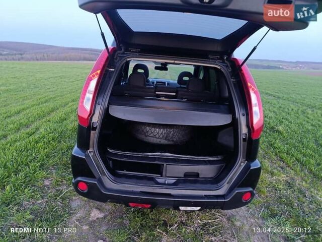 Черный Ниссан ИксТрейл, объемом двигателя 2 л и пробегом 206 тыс. км за 11600 $, фото 16 на Automoto.ua