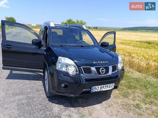 Черный Ниссан ИксТрейл, объемом двигателя 2 л и пробегом 206 тыс. км за 11600 $, фото 28 на Automoto.ua