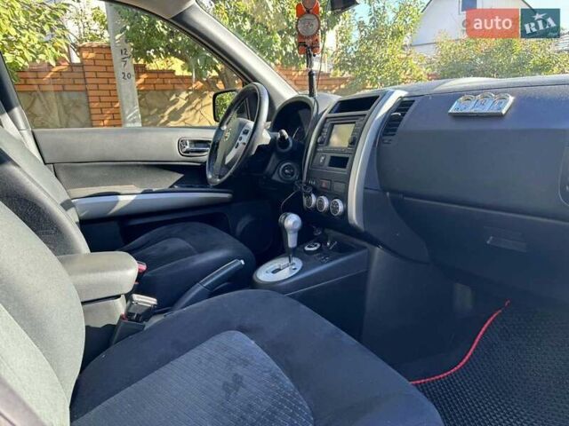 Чорний Ніссан ІксТрейл, об'ємом двигуна 2 л та пробігом 228 тис. км за 15200 $, фото 9 на Automoto.ua