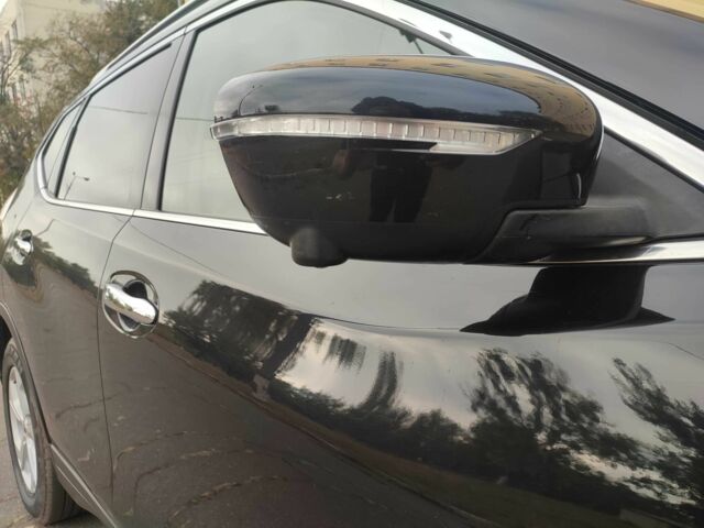 Черный Ниссан ИксТрейл, объемом двигателя 1.6 л и пробегом 223 тыс. км за 15000 $, фото 6 на Automoto.ua