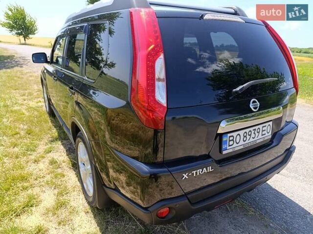 Черный Ниссан ИксТрейл, объемом двигателя 2 л и пробегом 206 тыс. км за 11600 $, фото 26 на Automoto.ua