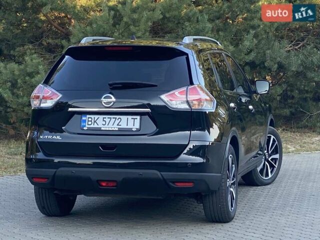 Черный Ниссан ИксТрейл, объемом двигателя 1.6 л и пробегом 104 тыс. км за 16950 $, фото 1 на Automoto.ua