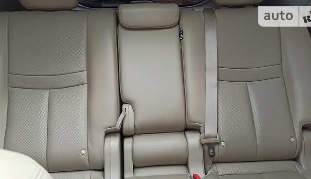 Черный Ниссан ИксТрейл, объемом двигателя 1.6 л и пробегом 230 тыс. км за 16000 $, фото 14 на Automoto.ua