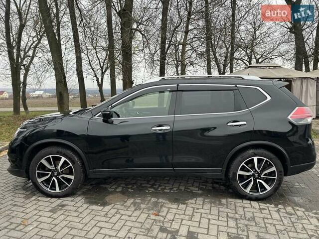 Черный Ниссан ИксТрейл, объемом двигателя 1.6 л и пробегом 230 тыс. км за 14200 $, фото 1 на Automoto.ua