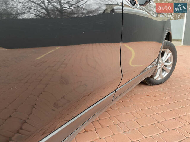 Черный Ниссан ИксТрейл, объемом двигателя 1.6 л и пробегом 210 тыс. км за 12800 $, фото 5 на Automoto.ua