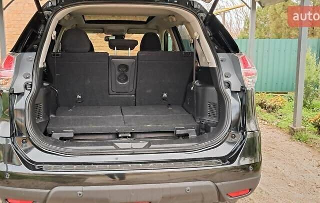 Черный Ниссан ИксТрейл, объемом двигателя 1.6 л и пробегом 202 тыс. км за 17000 $, фото 12 на Automoto.ua