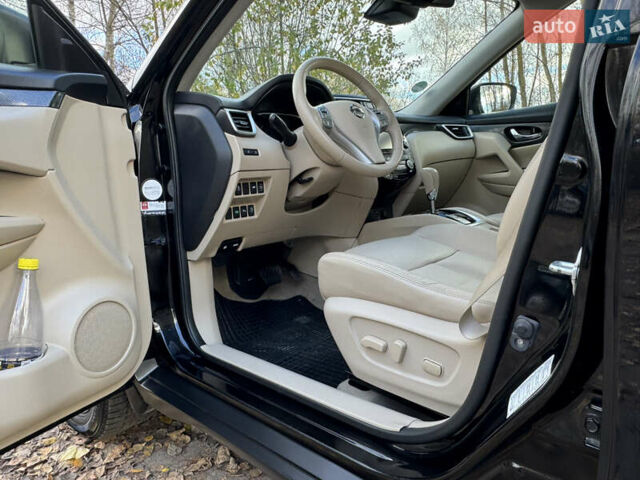 Черный Ниссан ИксТрейл, объемом двигателя 1.6 л и пробегом 215 тыс. км за 18200 $, фото 16 на Automoto.ua