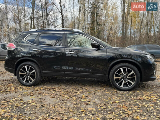 Черный Ниссан ИксТрейл, объемом двигателя 1.6 л и пробегом 215 тыс. км за 18200 $, фото 3 на Automoto.ua