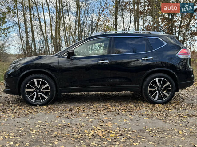 Черный Ниссан ИксТрейл, объемом двигателя 1.6 л и пробегом 215 тыс. км за 18200 $, фото 7 на Automoto.ua