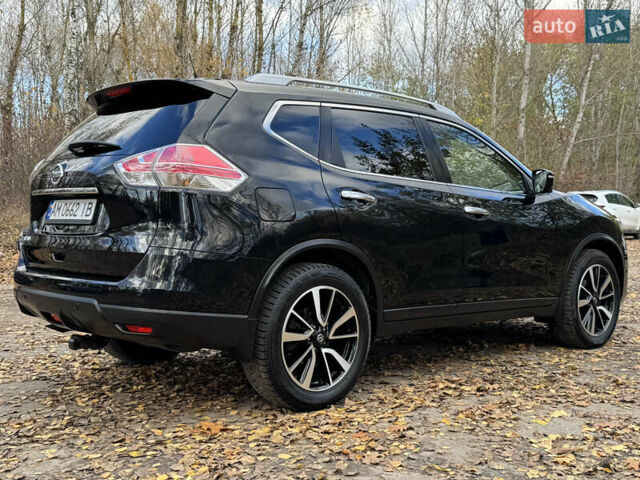 Черный Ниссан ИксТрейл, объемом двигателя 1.6 л и пробегом 215 тыс. км за 18200 $, фото 4 на Automoto.ua