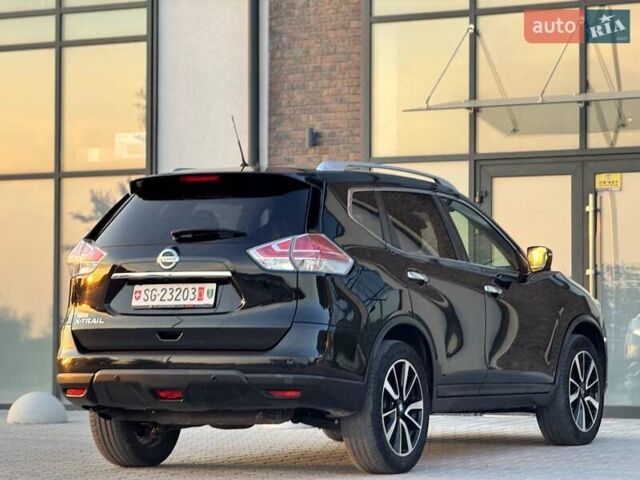 Черный Ниссан ИксТрейл, объемом двигателя 2 л и пробегом 220 тыс. км за 17990 $, фото 16 на Automoto.ua