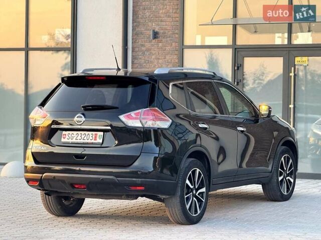 Черный Ниссан ИксТрейл, объемом двигателя 2 л и пробегом 220 тыс. км за 17990 $, фото 18 на Automoto.ua