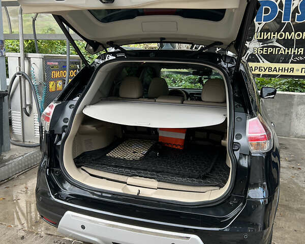 Черный Ниссан ИксТрейл, объемом двигателя 2.49 л и пробегом 92 тыс. км за 22000 $, фото 16 на Automoto.ua