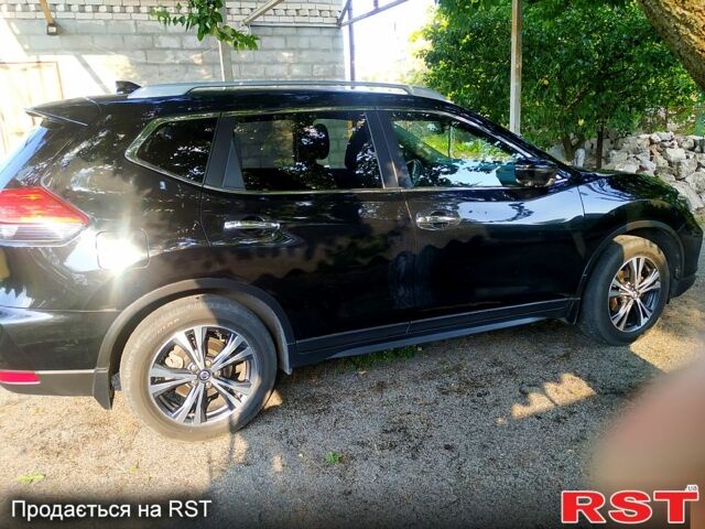 Черный Ниссан ИксТрейл, объемом двигателя 1.6 л и пробегом 100 тыс. км за 23500 $, фото 5 на Automoto.ua