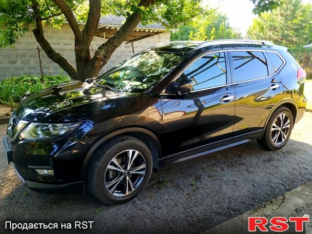 Черный Ниссан ИксТрейл, объемом двигателя 1.6 л и пробегом 100 тыс. км за 23500 $, фото 2 на Automoto.ua