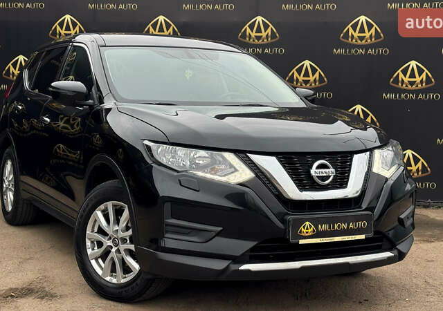 Черный Ниссан ИксТрейл, объемом двигателя 2 л и пробегом 129 тыс. км за 18300 $, фото 6 на Automoto.ua