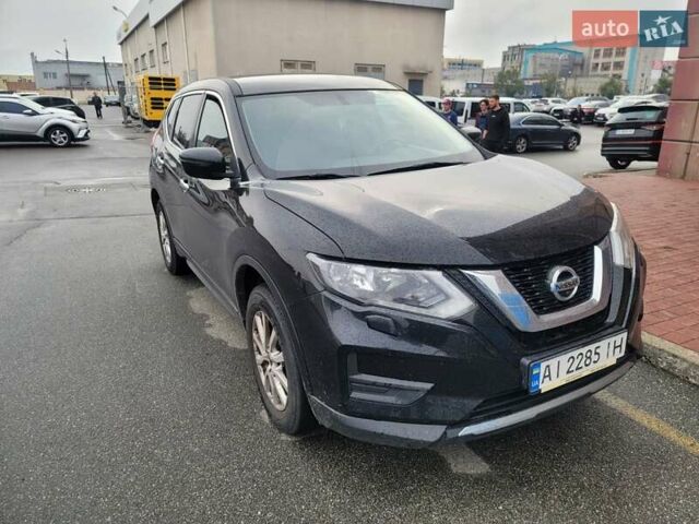 Чорний Ніссан ІксТрейл, об'ємом двигуна 2 л та пробігом 128 тис. км за 18500 $, фото 4 на Automoto.ua