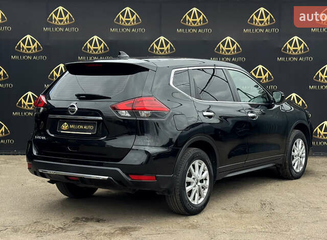 Черный Ниссан ИксТрейл, объемом двигателя 2 л и пробегом 129 тыс. км за 18300 $, фото 5 на Automoto.ua