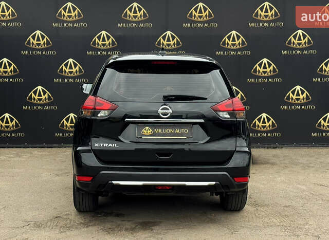 Черный Ниссан ИксТрейл, объемом двигателя 2 л и пробегом 129 тыс. км за 18300 $, фото 4 на Automoto.ua