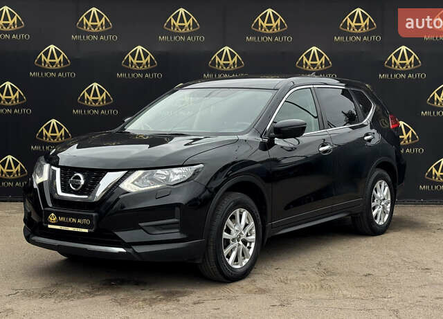 Черный Ниссан ИксТрейл, объемом двигателя 2 л и пробегом 129 тыс. км за 18300 $, фото 2 на Automoto.ua