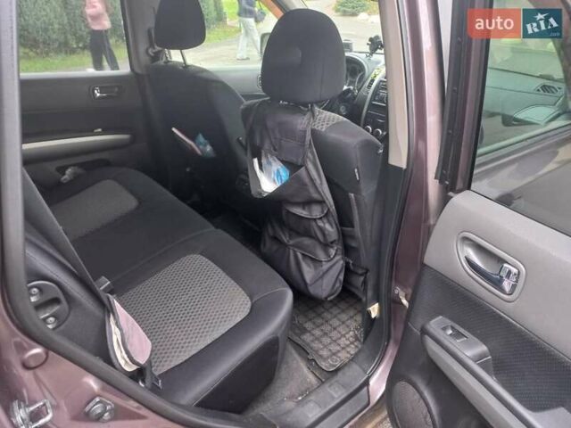 Фиолетовый Ниссан ИксТрейл, объемом двигателя 2 л и пробегом 265 тыс. км за 9200 $, фото 7 на Automoto.ua