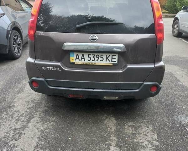 Фиолетовый Ниссан ИксТрейл, объемом двигателя 2 л и пробегом 265 тыс. км за 9200 $, фото 2 на Automoto.ua