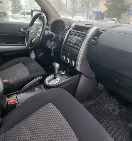 Фиолетовый Ниссан ИксТрейл, объемом двигателя 2 л и пробегом 237 тыс. км за 9100 $, фото 1 на Automoto.ua