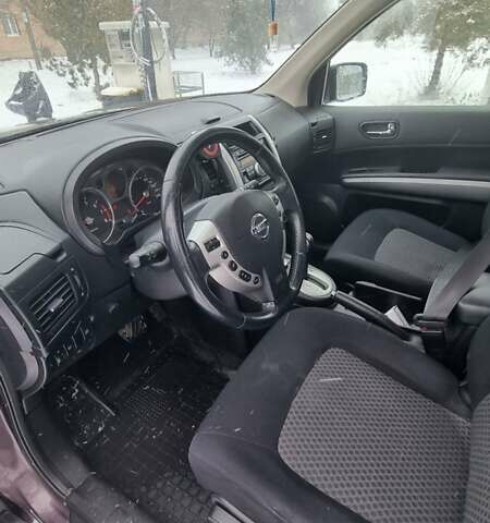 Фиолетовый Ниссан ИксТрейл, объемом двигателя 2 л и пробегом 237 тыс. км за 9100 $, фото 6 на Automoto.ua