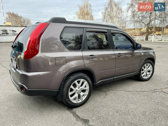 Фіолетовий Ніссан ІксТрейл, об'ємом двигуна 2 л та пробігом 190 тис. км за 10900 $, фото 11 на Automoto.ua