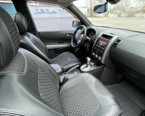 Фіолетовий Ніссан ІксТрейл, об'ємом двигуна 2 л та пробігом 190 тис. км за 10900 $, фото 21 на Automoto.ua