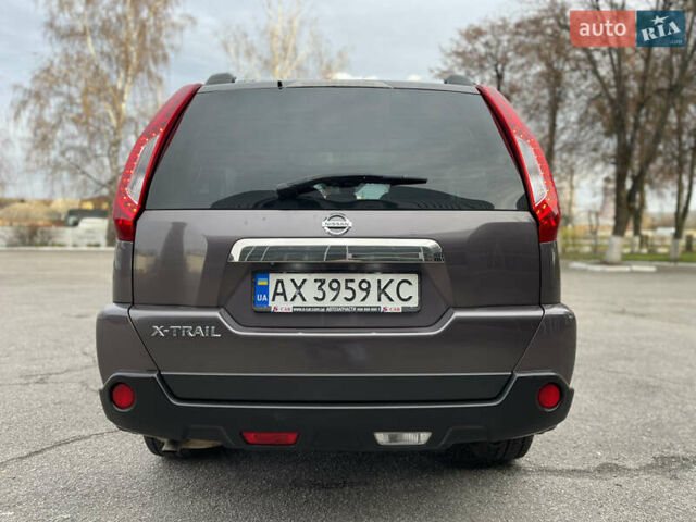 Фіолетовий Ніссан ІксТрейл, об'ємом двигуна 2 л та пробігом 190 тис. км за 10900 $, фото 8 на Automoto.ua