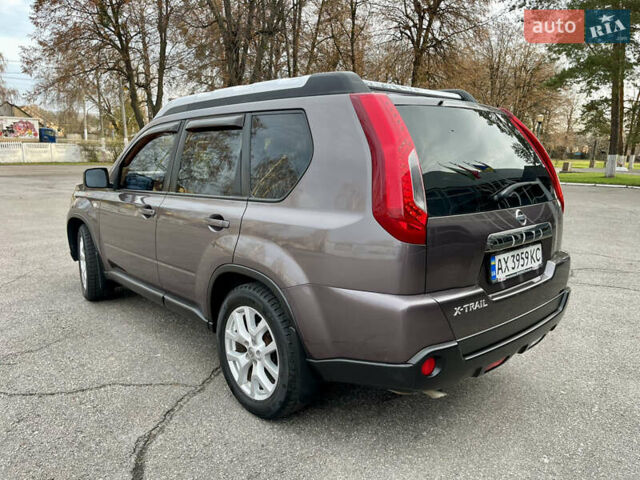 Фіолетовий Ніссан ІксТрейл, об'ємом двигуна 2 л та пробігом 190 тис. км за 10900 $, фото 6 на Automoto.ua