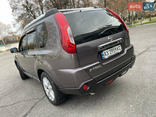 Фіолетовий Ніссан ІксТрейл, об'ємом двигуна 2 л та пробігом 190 тис. км за 10900 $, фото 7 на Automoto.ua